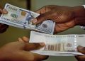 naira-gains-3%-against-dollar-in-parallel-market,-closes-at-1,570/$1