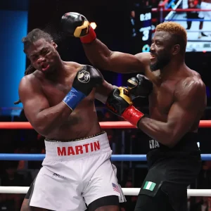 ajagba-stops-former-ibf-champion-martin-in-brutal-fourth-round-knockout,-calls-out-usyk