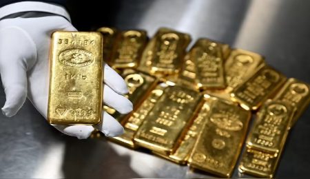 gold-drops-as-dollar-gains-on-strong-jobs-data